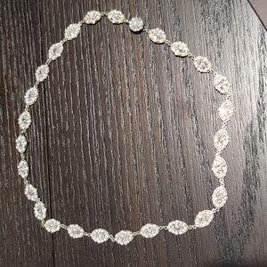 Necklace that can also be used for hair accessory. Costume jewelry.